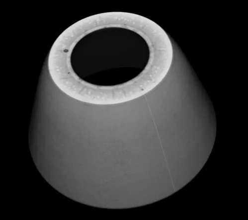 CT volume rendering of a conical filled component with its internal structure visible